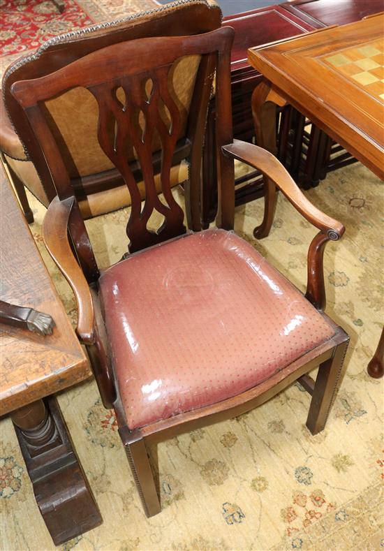 A set of seven Chippendale style dining chairs